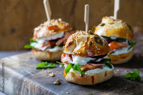 Photography Brioche buns with hot smoked salmon, beetroot, salad and yogurt dressing
