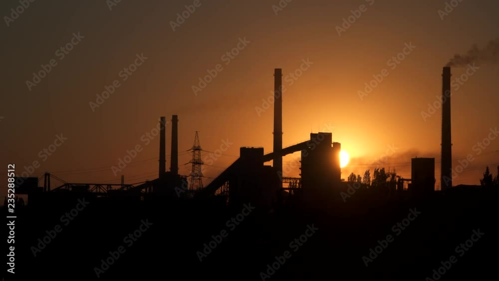 Smoke from the factory chimney. On the background of the sunrise. Smoke from the factory chimney. On the background of the sunrise.