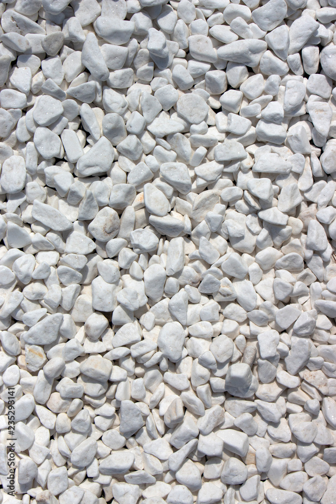 Marble crumb, natural mineral white background. Textured surface of decorative crushed stone. Marble crumb, natural mineral white background. Textured surface of decorative crushed stone.