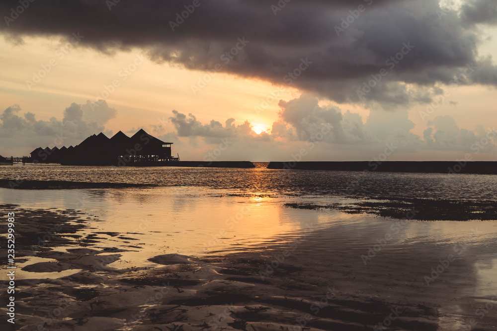 Fototapeta premium Beach at the Maldives at Sunset