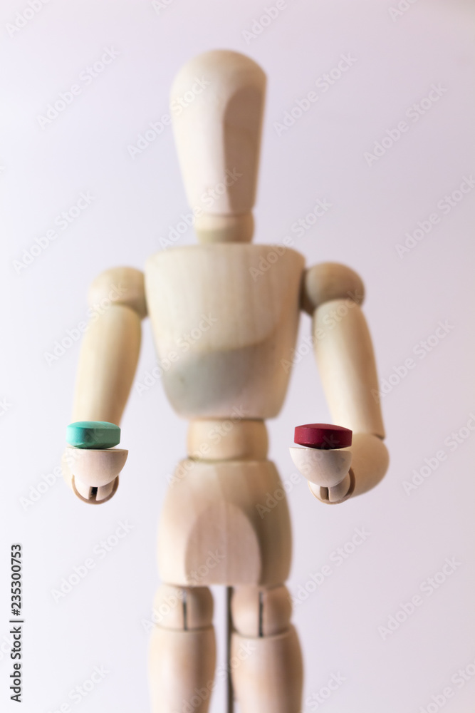Colored pills in the hands of the model. Colored pills in the hands of the model.