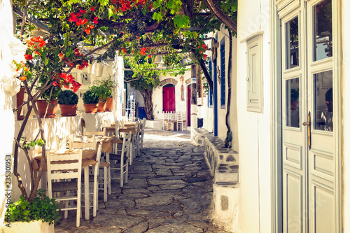 Traditional mediterranean colorful street on Amorgos island  Cyclades  Greece