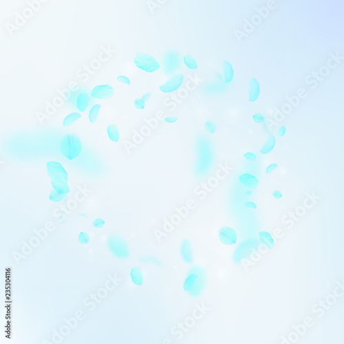 Turquoise flower petals falling down. Terrific rom
