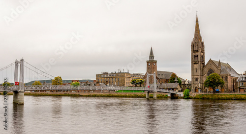 Bridge over river Ness and two churches on an opposite bank  Inverness  Scotland