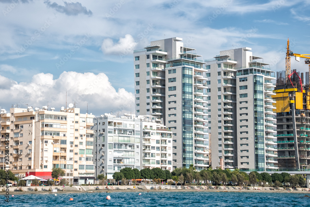 Fototapeta premium Limassol downtown and apartment buildings at waterfront. Cyprus