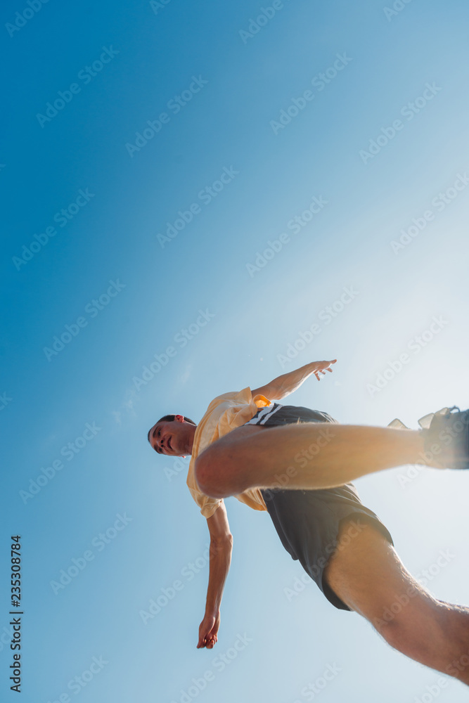 Fototapeta premium Free runner make parkour in the air