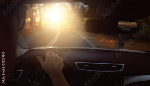 Sunny day on the road in car