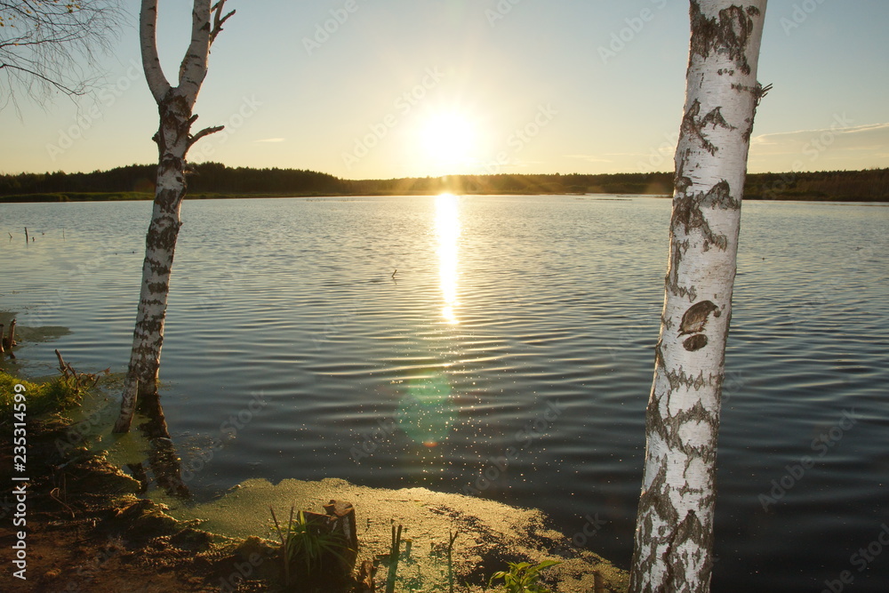Evening fishing on the forest lake in Central Russia Evening fishing on the forest lake in Central Russia