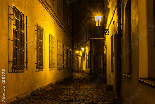 Old cobbled streets and buildings of Prague Old Town at night in Autumn - 3