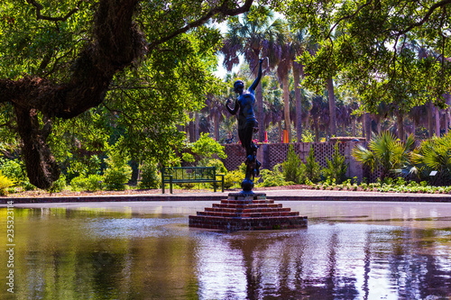 statue in a pond photo