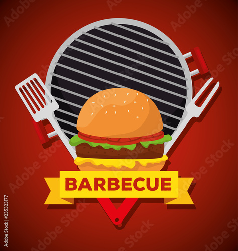 hamburger in the grill with fork and slice utensils