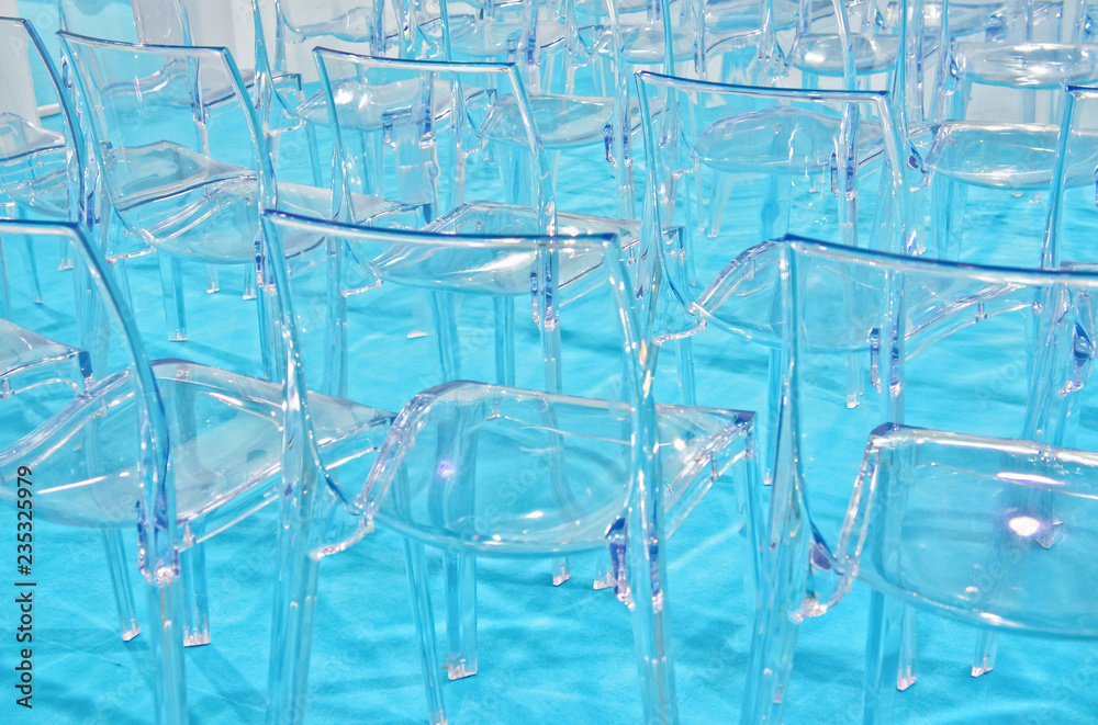 Transparent plastic chairs with copy space Transparent plastic chairs with copy space