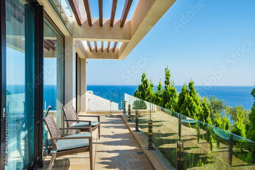 Terrace of a spacious luxury villa with a picturesque sea view