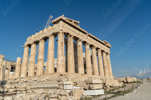Morning view of the beautiful ancient monument, the Parthenon, with its ionic columns, in the Acropolis in Athens, Greece.
