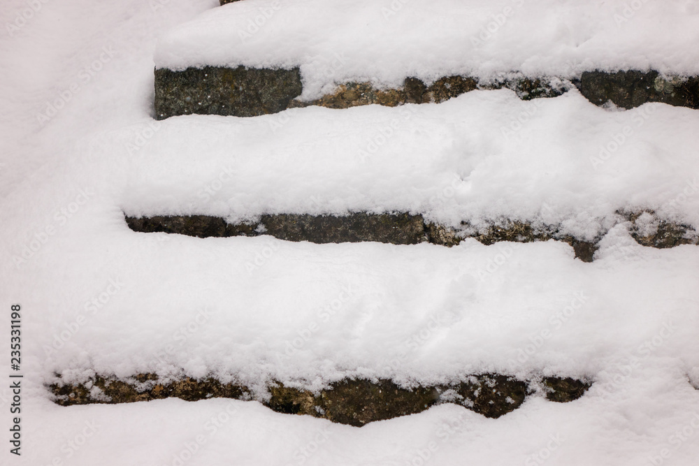 Old stone staircase in winter