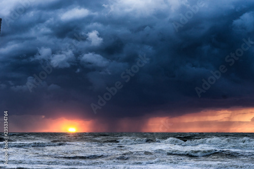 Storm over North Sea at sunset