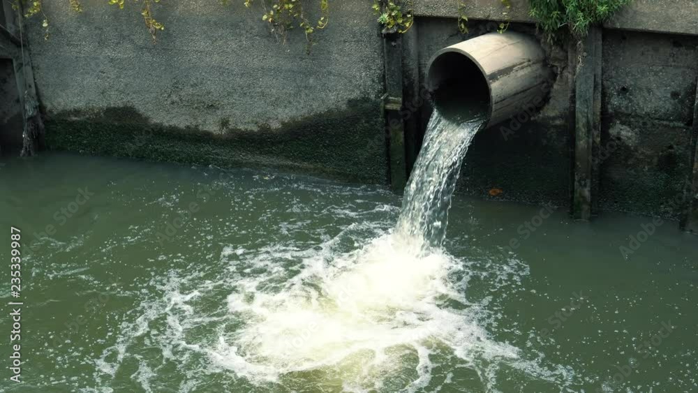 custom made wallpaper toronto digitalWater flows down from sewer pipe into drainage canal in the downtown