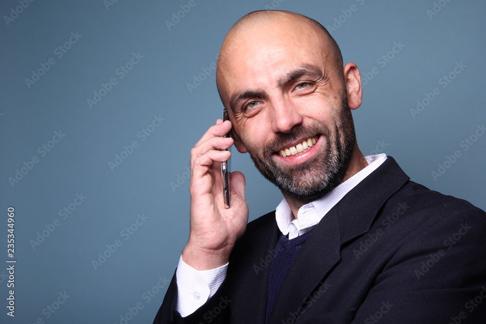 Beautiful man in front of a colored background Beautiful man in front of a colored background