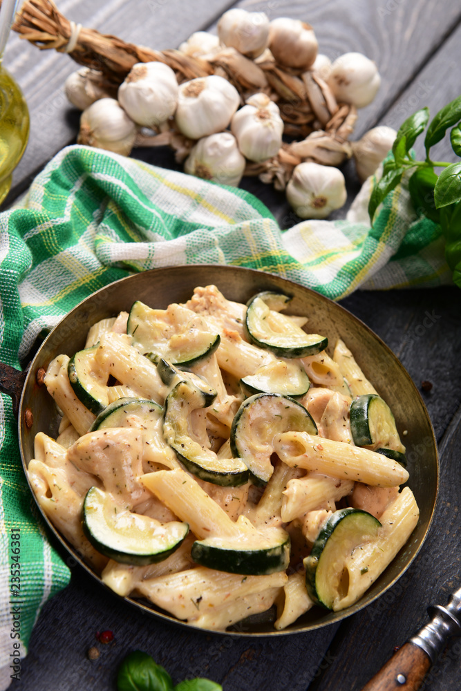 Penne pasta witch chicken and zucchini in cheese sauce Penne pasta witch chicken and zucchini in cheese sauce