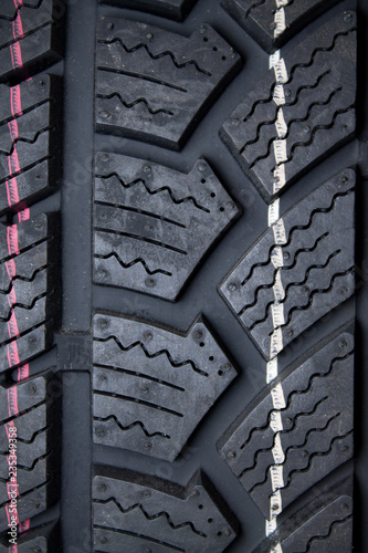 winter tire tread texture on black background