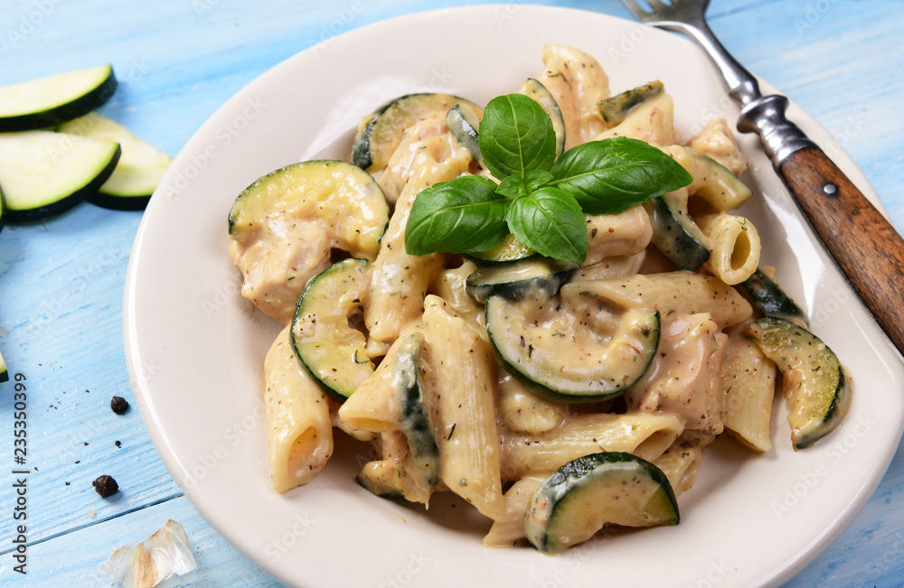 Penne pasta witch chicken and zucchini in cheese sauce Penne pasta witch chicken and zucchini in cheese sauce