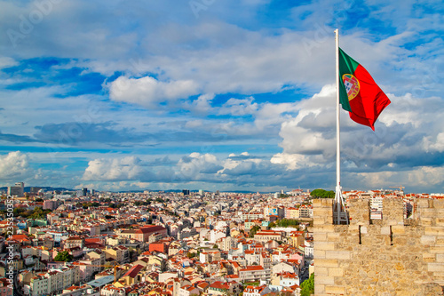 Flag of Portugal against panorama od Lisbon © gswozniak