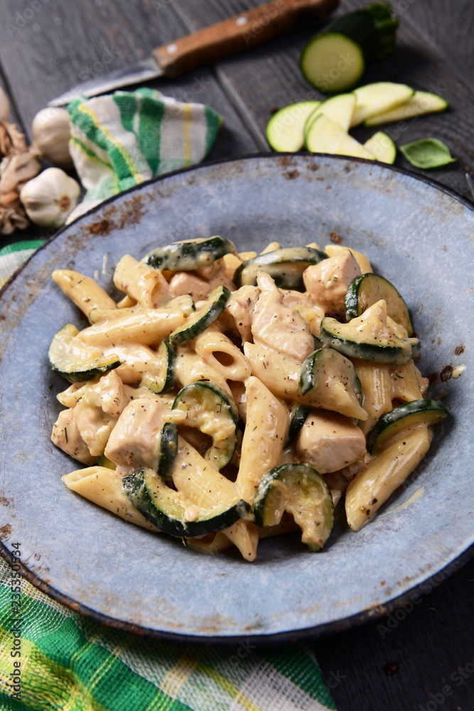Penne pasta witch chicken and zucchini in cheese sauce Penne pasta witch chicken and zucchini in cheese sauce