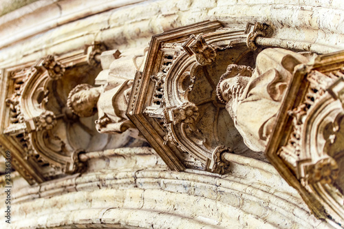 Brussels, Kingdom of Belgium. The exterior of the church is decorated.  Graceful facade and richly carved doors.