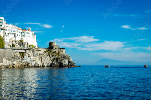 Amalfi village with houses, located on rock, Amalfi coast with Gulf of Salerno.