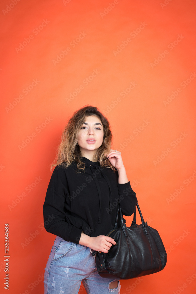 Shopping abstract: beautiful girl with a black bag Shopping abstract: beautiful girl with a black bag