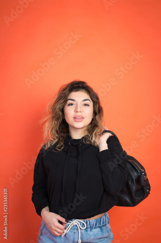 Shopping abstract: beautiful girl with a black bag