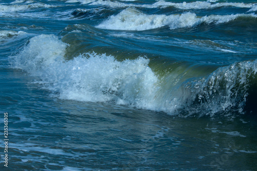 Blurred Sea Background. Cropped Shot Of The Sea Water. Sea Waves.