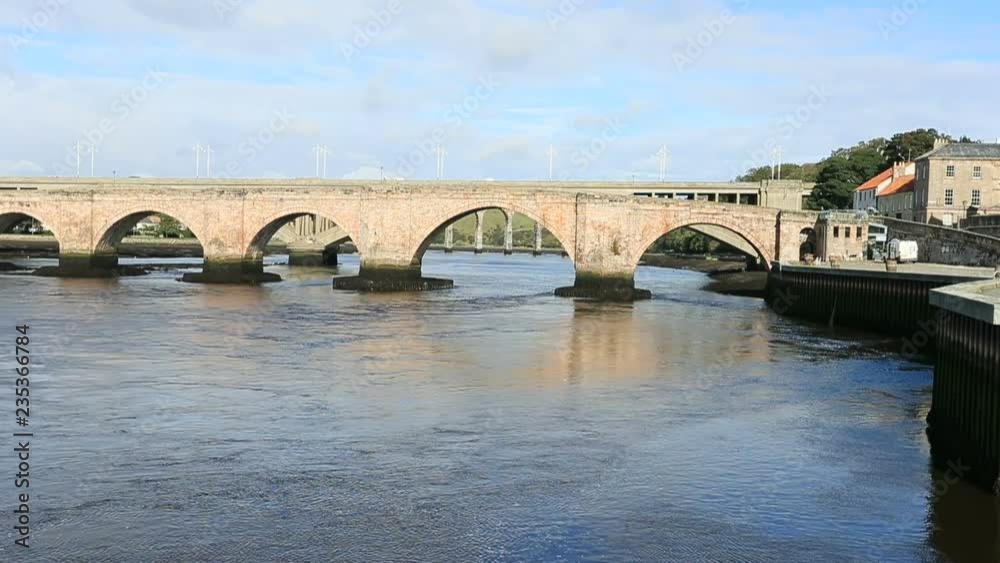 Berwick Upon Tweed England old bridge river pan. Northernmost town in England at the mouth of the River Tweed. An Anglo Saxon settlement from 10th century. Traditional market town. Berwick Upon Tweed England old bridge river pan. Northernmost town in England at the mouth of the River Tweed. An Anglo Saxon settlement from 10th century. Traditional market town.