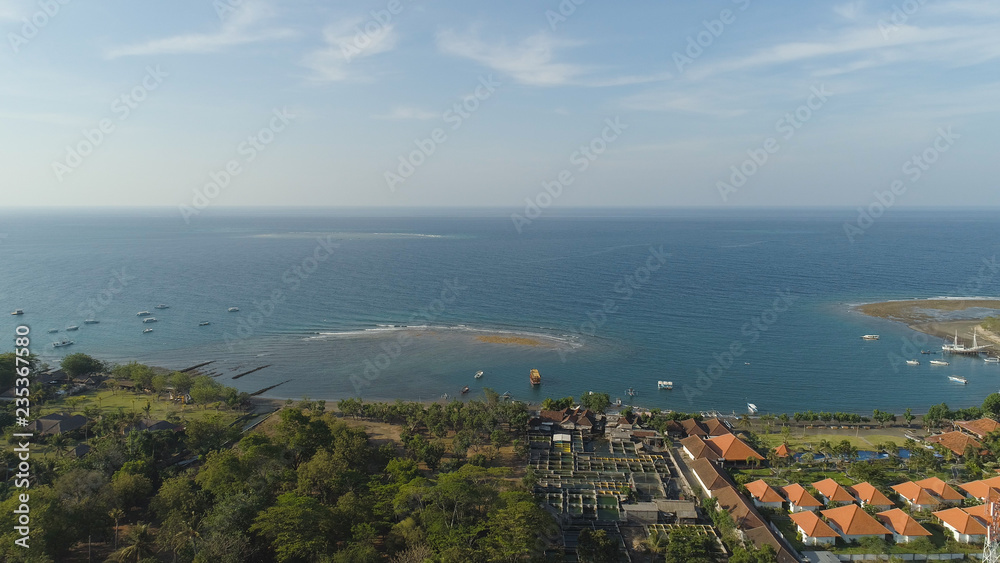 sea coast with tropical beach. aerial seascape tropical landscape, sea, boats on the surface water. Bali,Indonesia, travel concept.