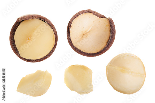 Shelled macadamia nuts isolated on white background. Top view. Flat lay pattern