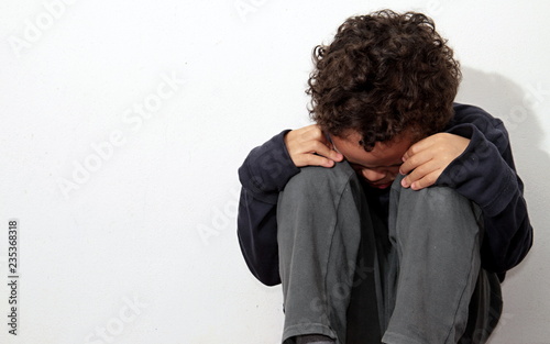  boy crying in poverty