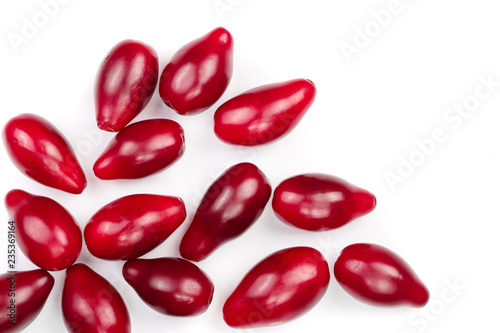 Red berries of cornel or dogwood isolated on white background with copy space for your text. Top view. Flat lay