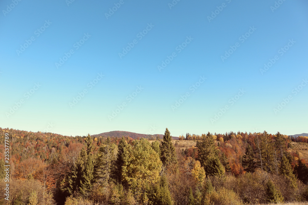 Picturesque landscape with blue sky over mountains