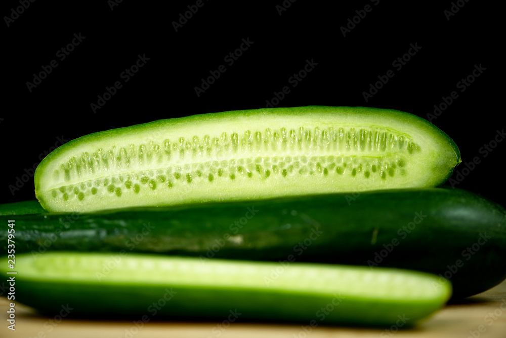 Fresh organic cucumbers on wood Fresh organic cucumbers on wood