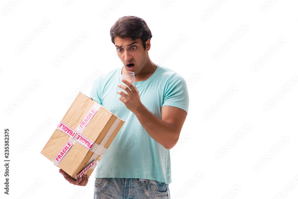 Young handsome man with fragile box ordered from Internet Young handsome man with fragile box ordered from Internet