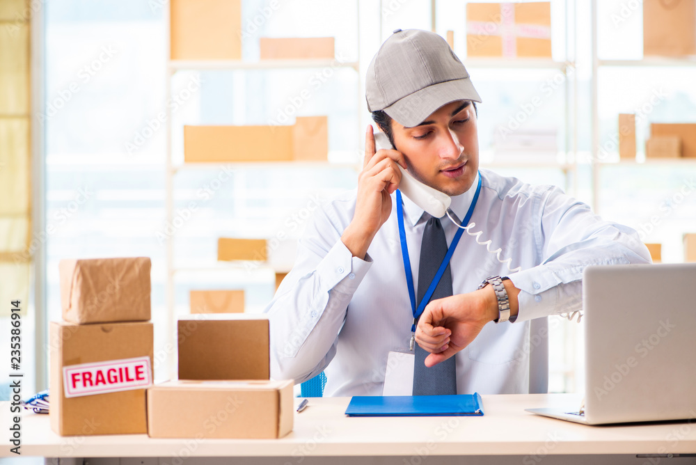 Male employee working in box delivery relocation service Male employee working in box delivery relocation service