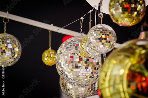 Christmas tree decorated with mirror disco ball. Ornament lighting and gliter decor for celebrate, merry christmas and Happy new year. photo