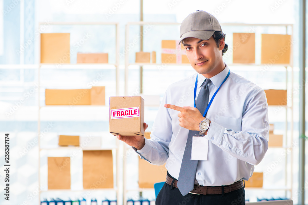 Male employee working in box delivery relocation service Male employee working in box delivery relocation service