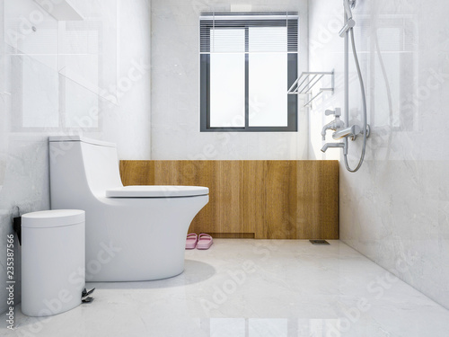 Clean modern bathroom with bathtub and toilet...