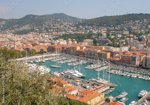 Sailboats, Boats, and Homes on a harbor in Nice, France