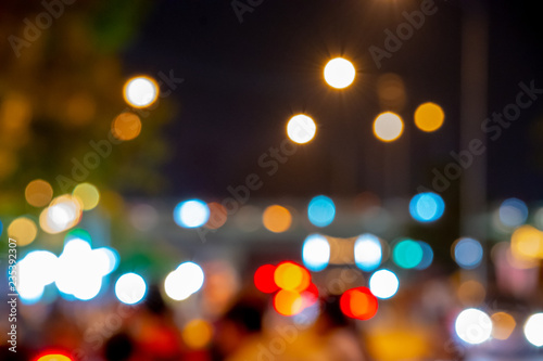 Lights blurred lights of cars on the road used as a background.