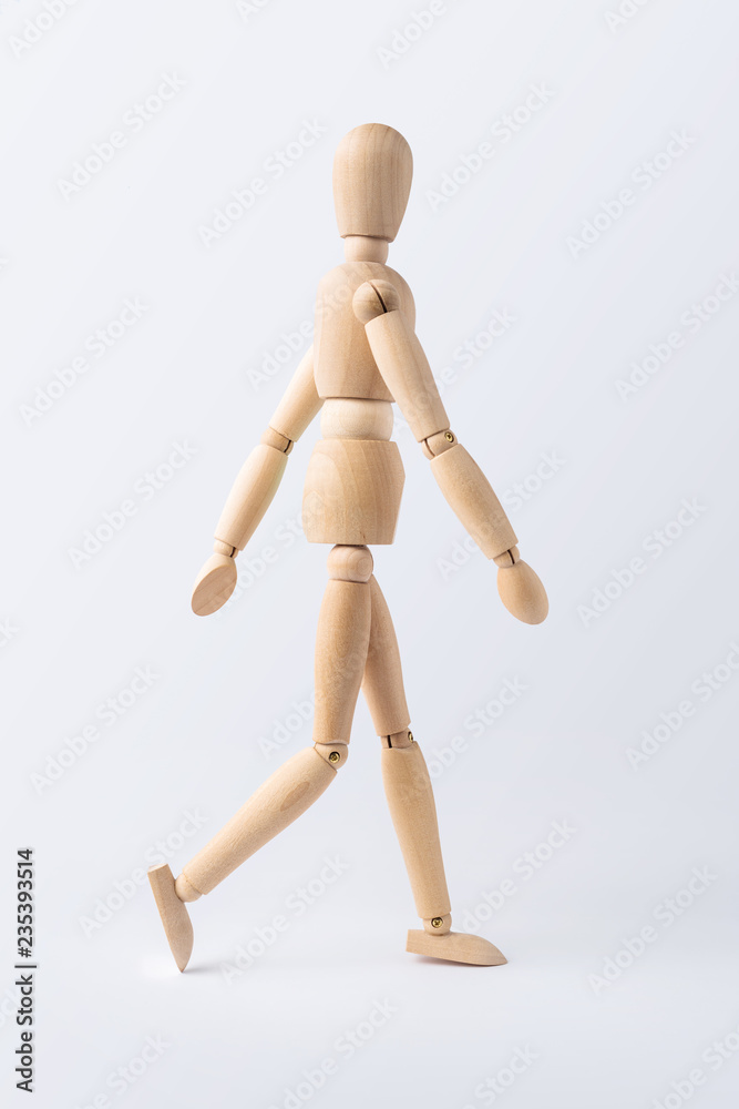 walk wooden mannequin isolated on white background walk wooden mannequin isolated on white background