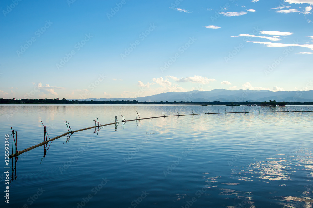 Beautiful View of Kwan Phayao, Thailand with soft-focus and over light in the background