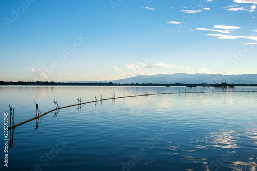Beautiful View of Kwan Phayao, Thailand with soft-focus and over light in the background