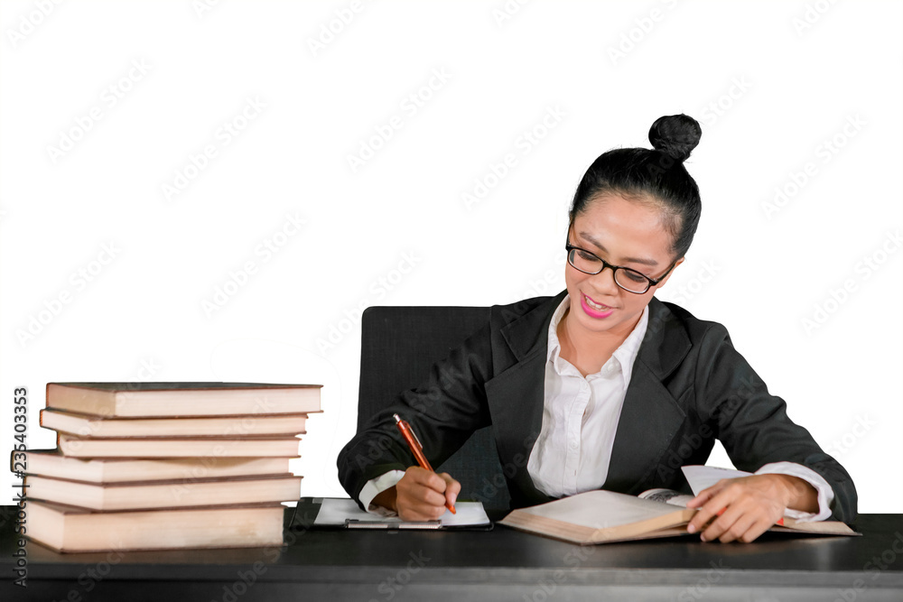 Young business woman writing on the clipboard Young business woman writing on the clipboard